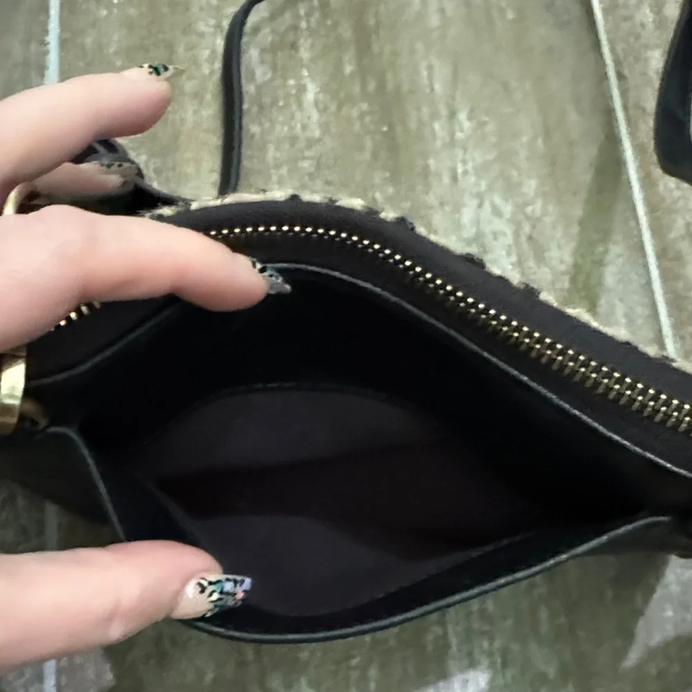 Joy Susan Black and Tan Spotted Clutch